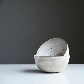 Two stacked white bowls
